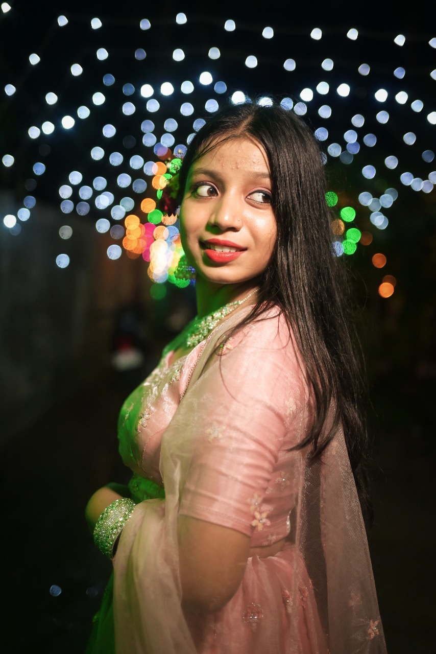 Deblina in a pink outfit